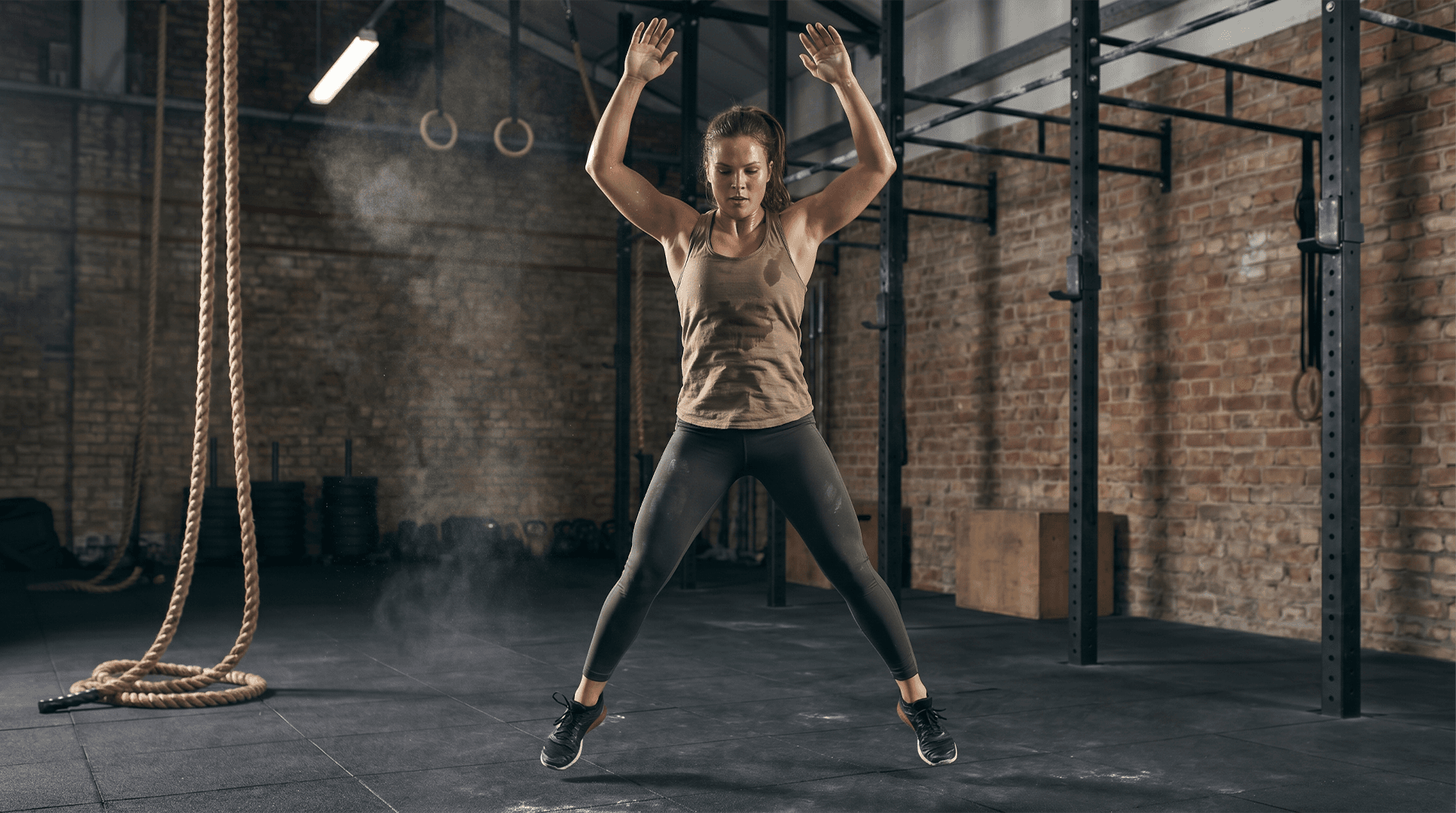 Woman performing jumping jacks