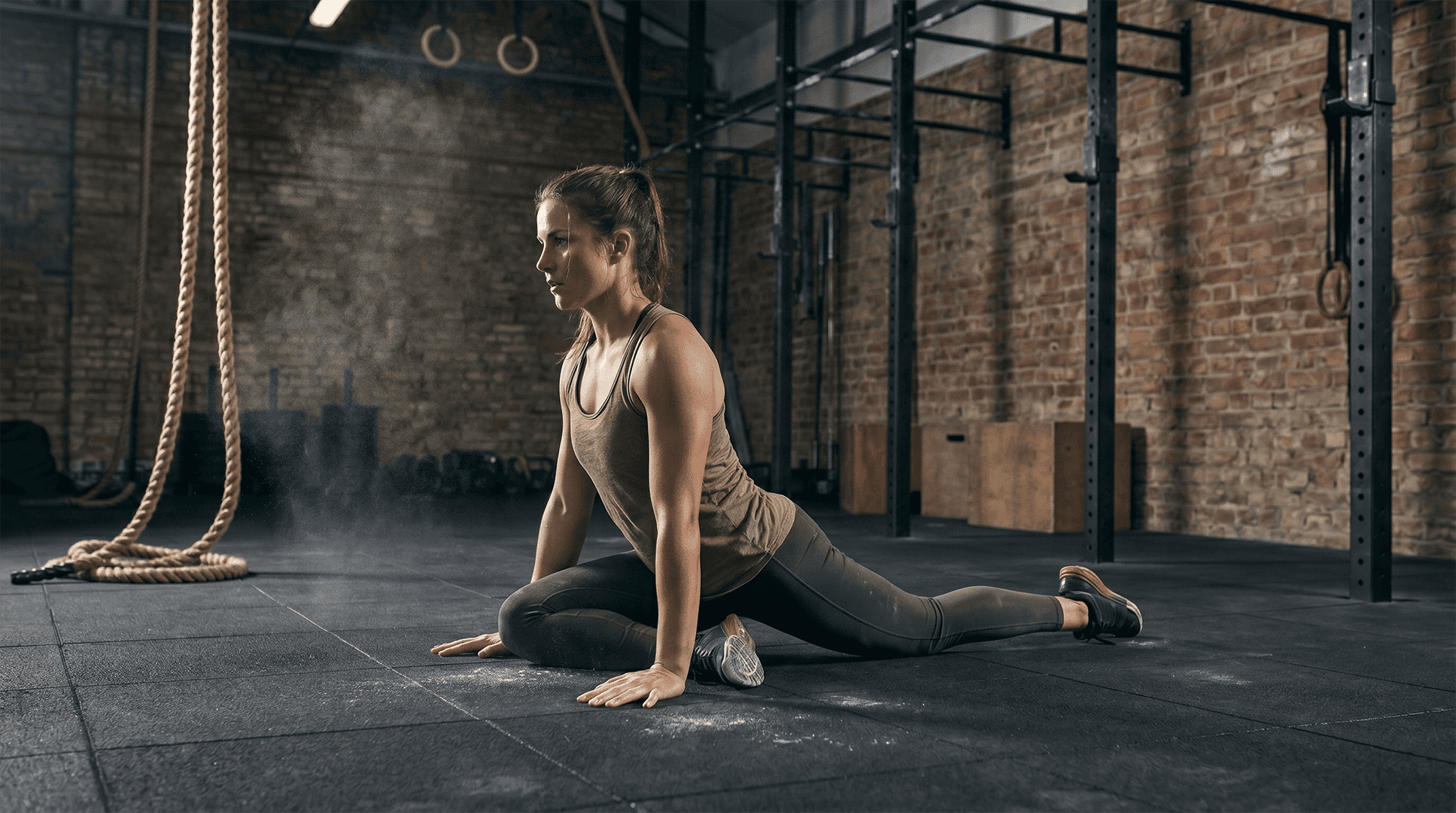 Woman performing pigeon pose