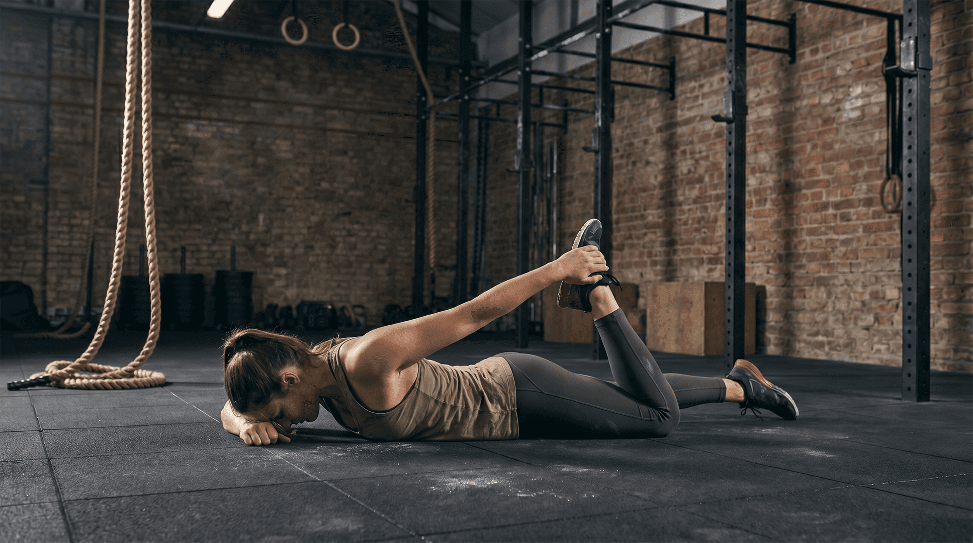Woman performing a quad stretch