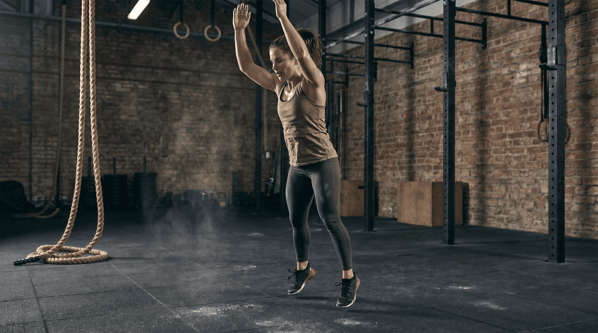 Woman performing squat jumps