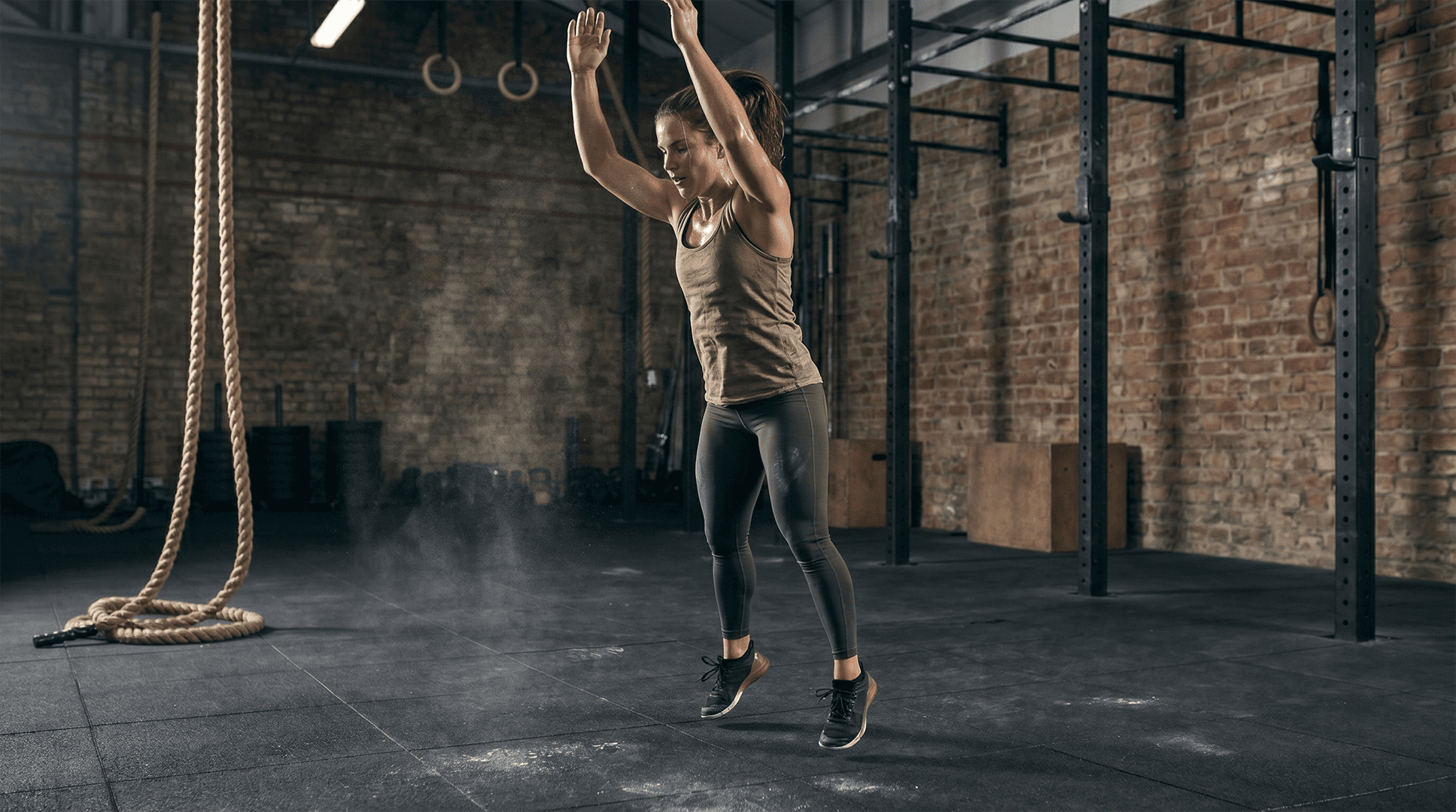 Woman performing squat jumps