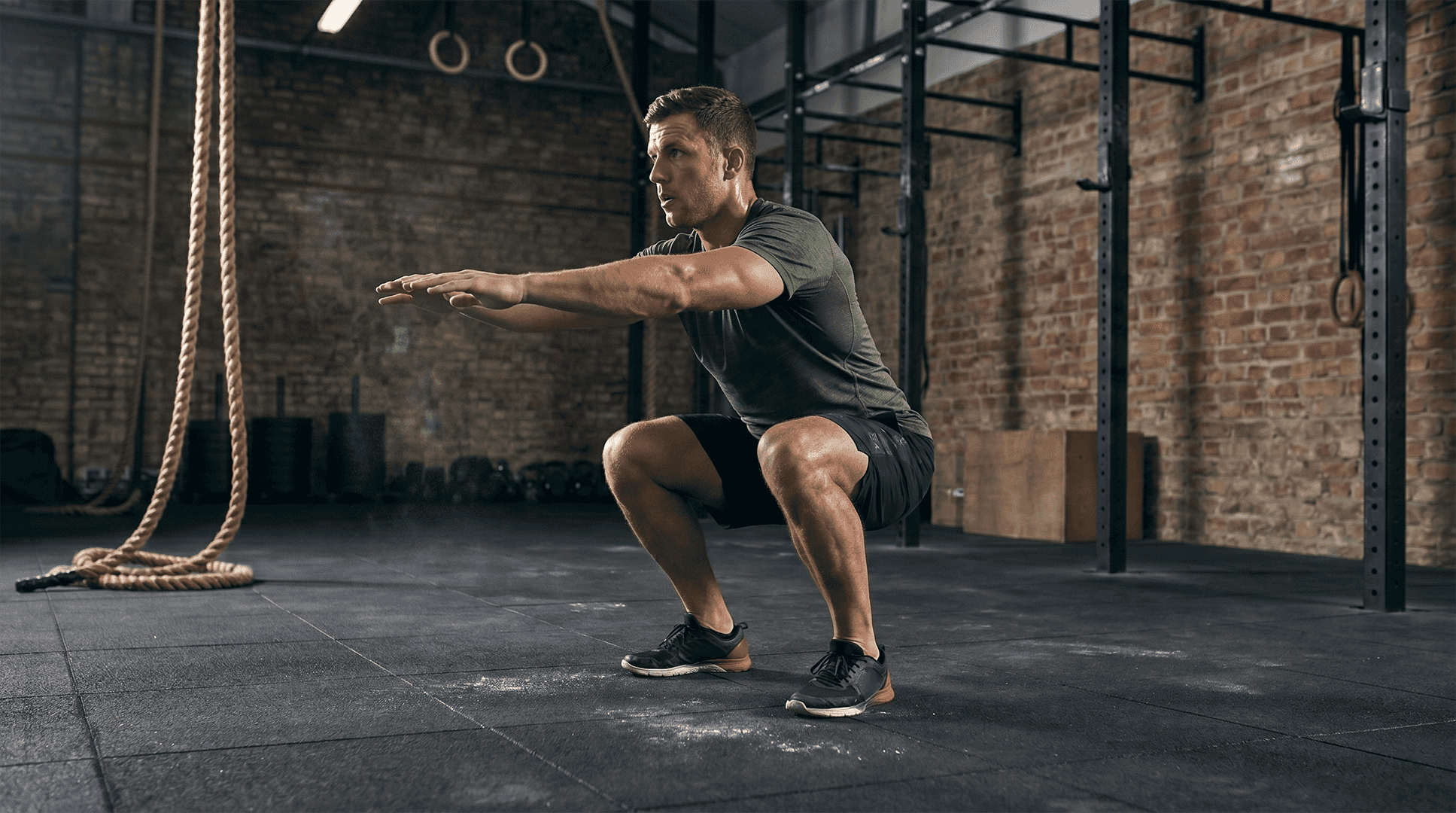 Man performing air squats