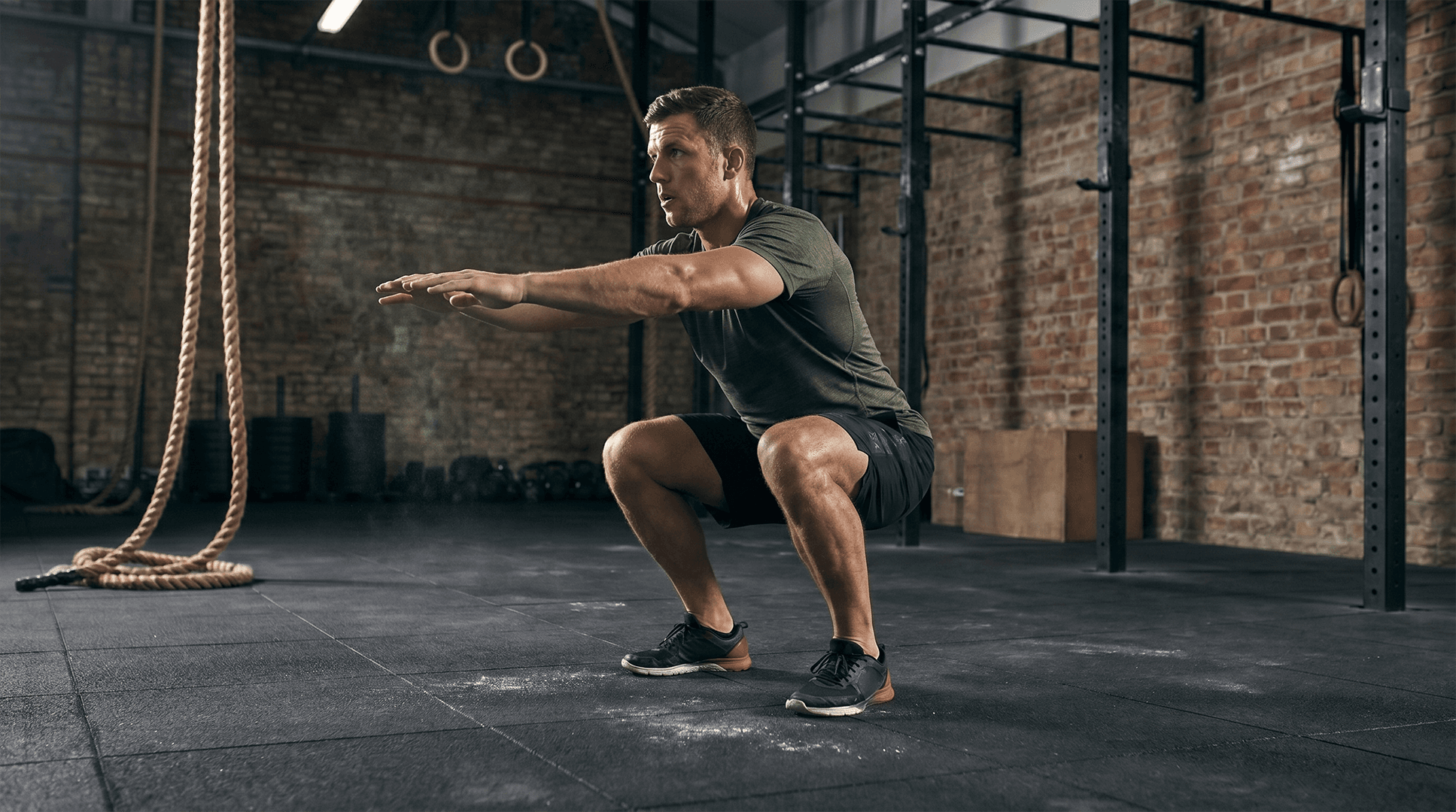 Man performing air squats