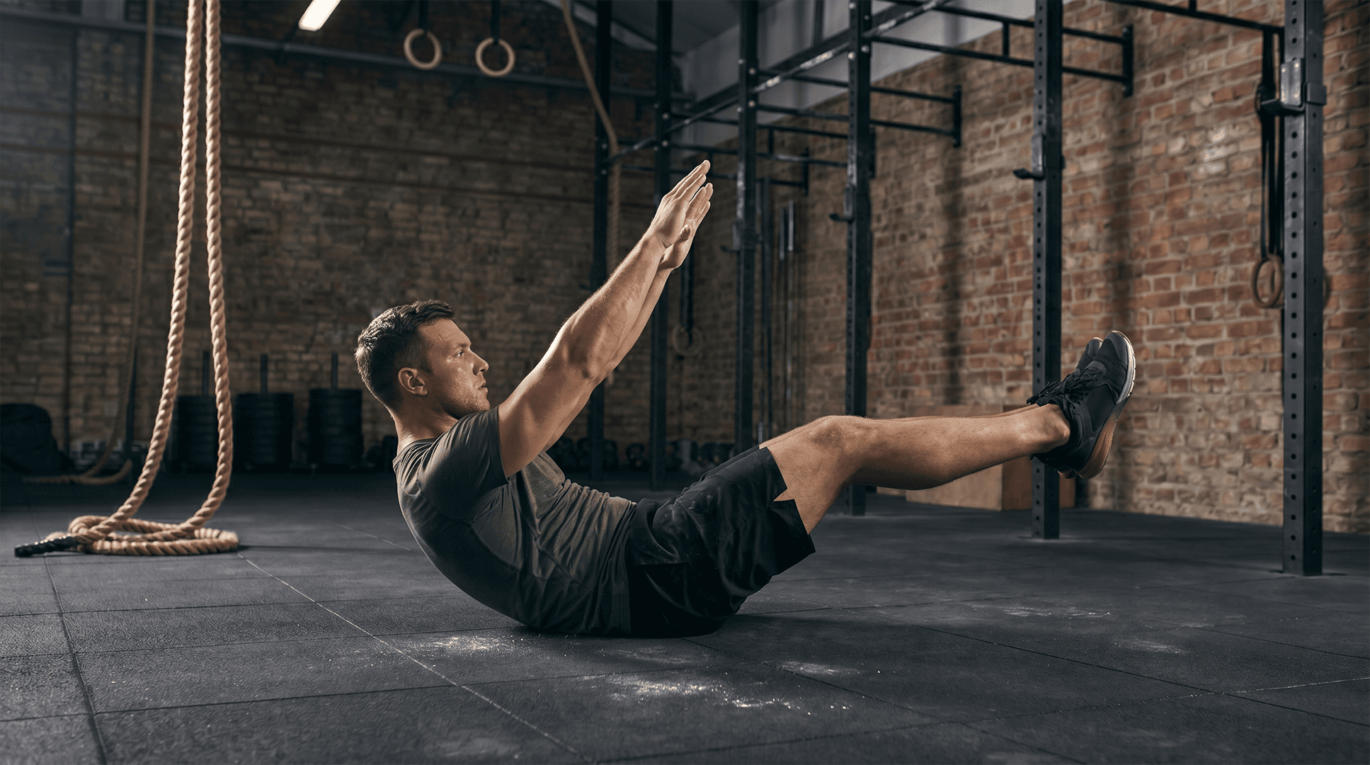 Man performing a hollow hold