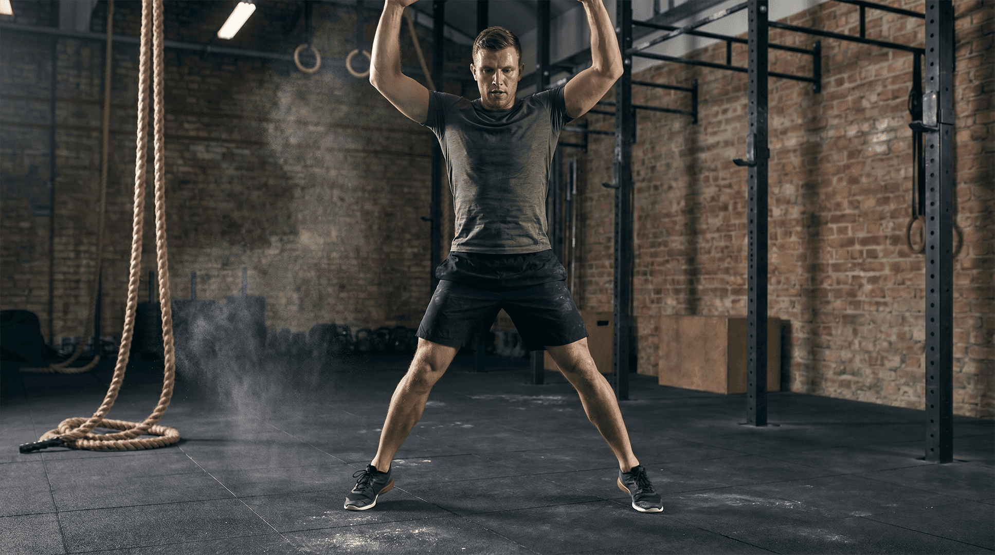 Man performing jumping jacks