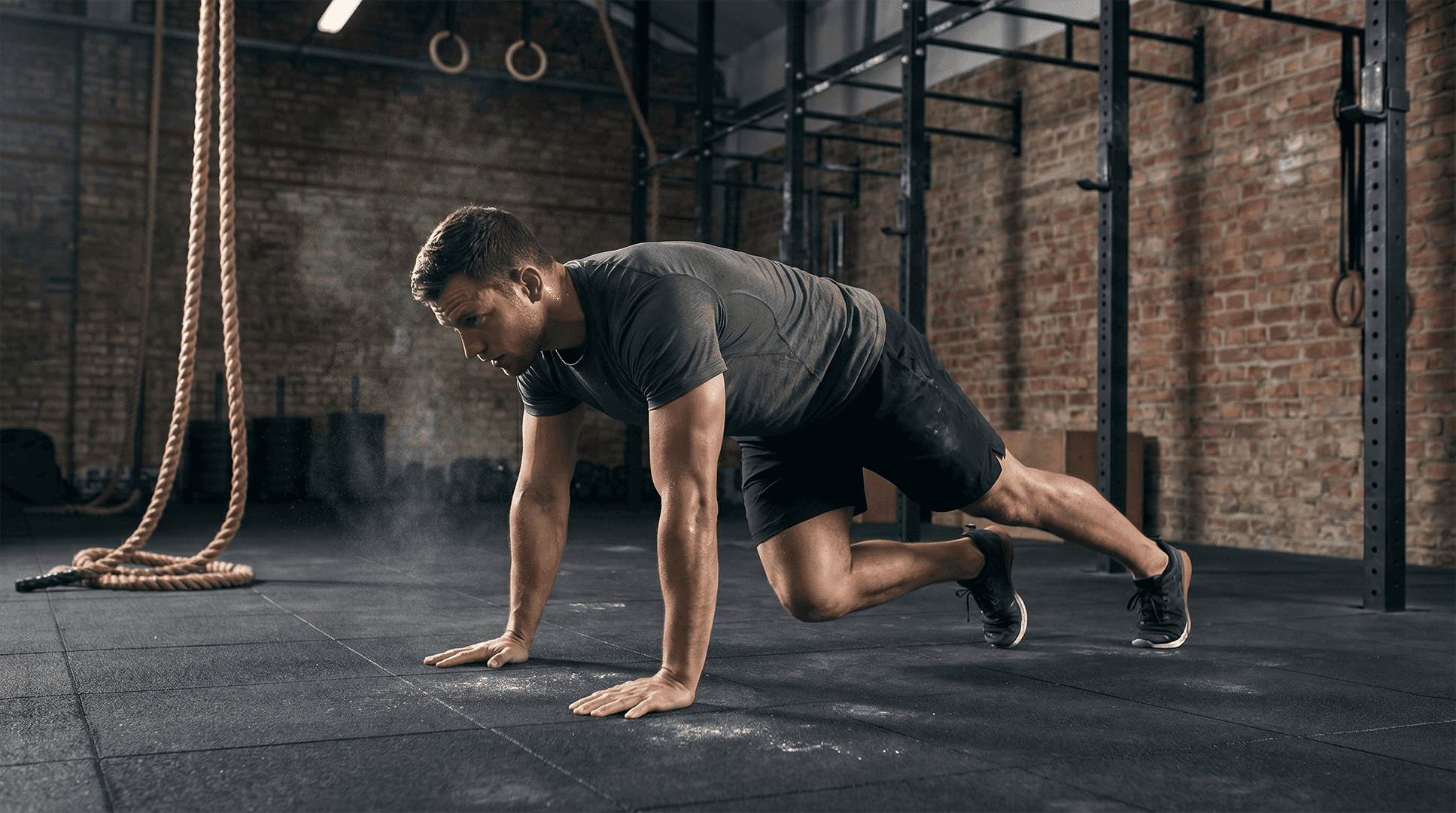 Man performing mountain climbers