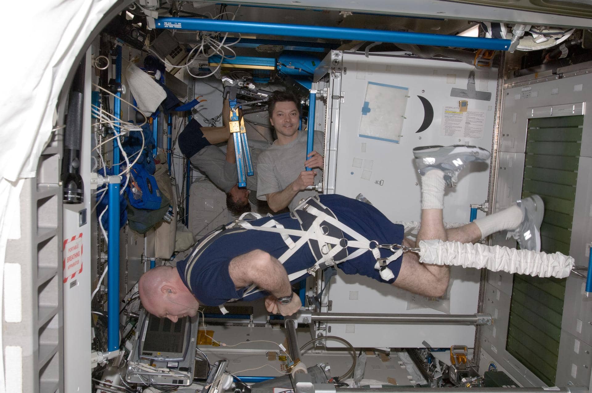 Astronauts exercising in the International Space Station